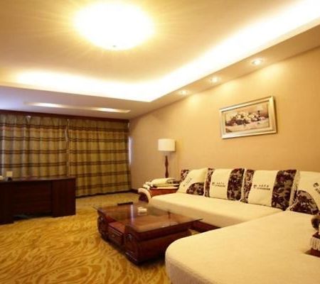 Everbright Hotel Dalian Habitación foto